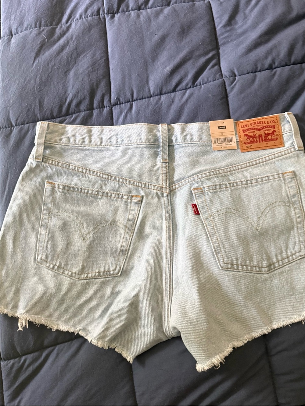 Levi's Light Blue Distressed High-Rise Jean Shorts - Picture 3 of 7